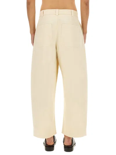 Studio Nicholson High-waisted Wide-leg Pants With Pleated Front In Neutral