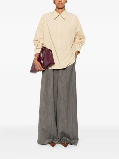 The Row Margan Long-sleeve Shirt With Curved Hem