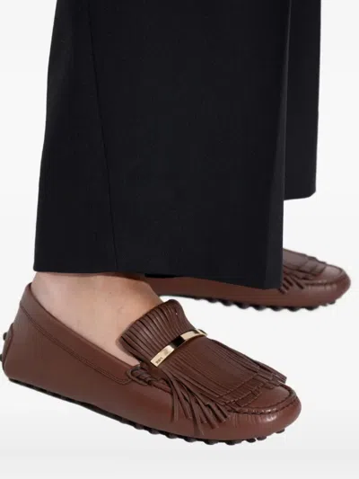 Tod's Gommino Embellished Fringed Leather Loafers In Brown