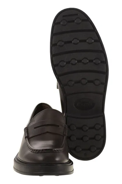 Tod's Mocassino Extralight 61k Loafers Black In Brown