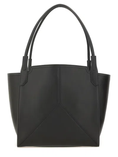 Victoria Beckham Victoria Black Handbag With V Stitching On The Front And Embossed Logo Lettering On The Front In Lea In Black