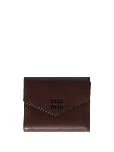 Miu Miu Compact Leather Wallet Fold-over Flap In Brown