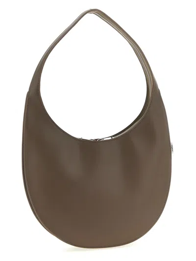 Coperni Medium Curved Shoulder Bag With Top Handle In Brown