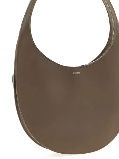 Coperni Medium Curved Shoulder Bag With Top Handle In Brown