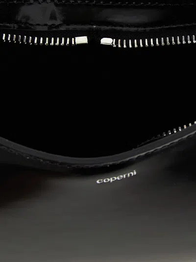 Coperni Crescent-shaped Calfskin Shoulder Bag With Embossed Logo In Black