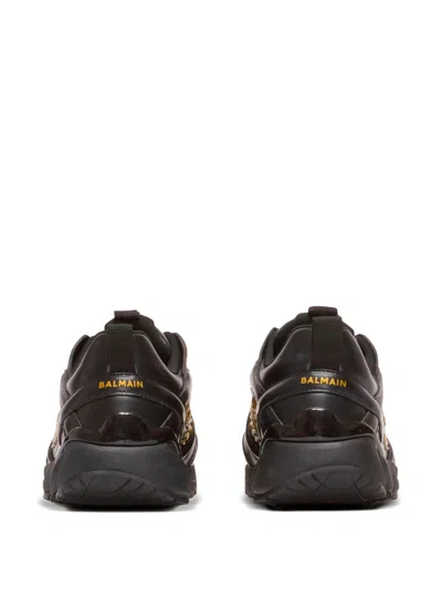 Balmain Cosmic Dust Glazed Leather Trainers In Black