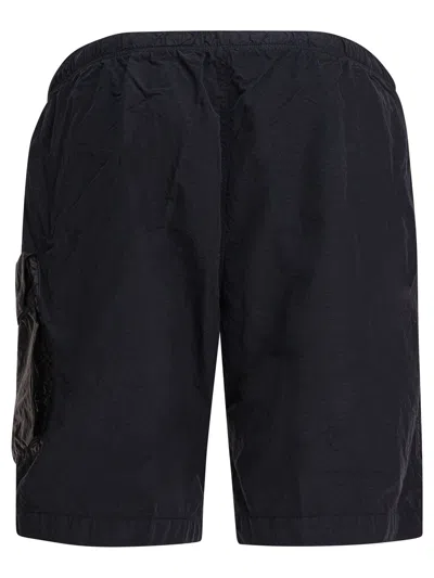 C.p. Company Black Minimalist Beach Shorts With Unique Lens Detail In Blue