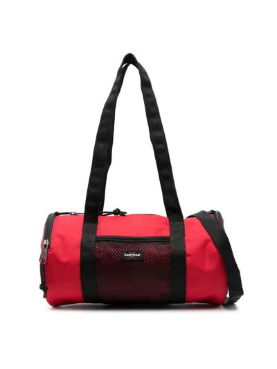 Eastpak X Telfar Medium Duffle Logo Patch Shoulder Bag In Red