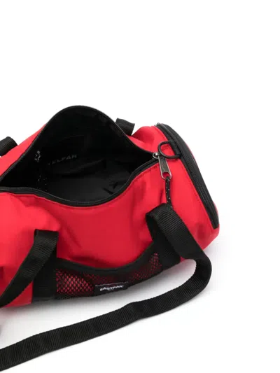 Eastpak X Telfar Medium Duffle Logo Patch Shoulder Bag In Red