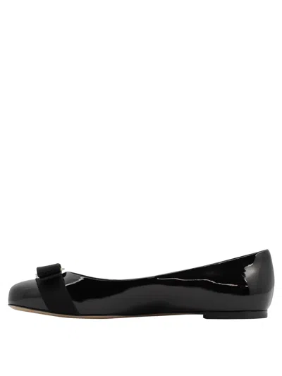 Ferragamo Glossy Leather Ballerinas With Bow Accent In Black
