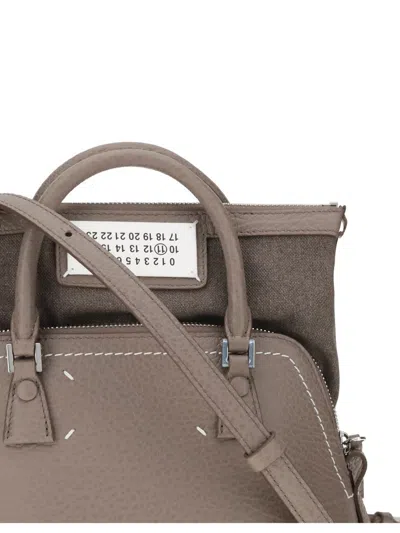 Maison Margiela Graphite Cowhide Bags In Gold