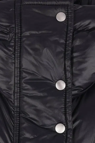 Jil Sander Coats In Black