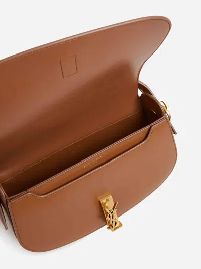 Saint Laurent Voltaire Tassels Bag In Brown