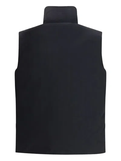 Laminar Padded And Quilted Sleeveless Jacket In Black