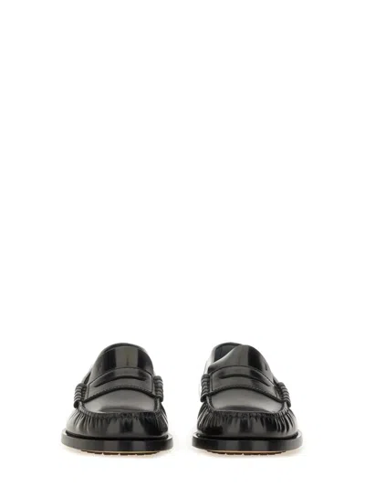 Tod's Polished Calf Leather Loafer With Classic Silhouette In Black