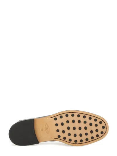 Tod's Polished Calf Leather Loafer With Classic Silhouette In Black