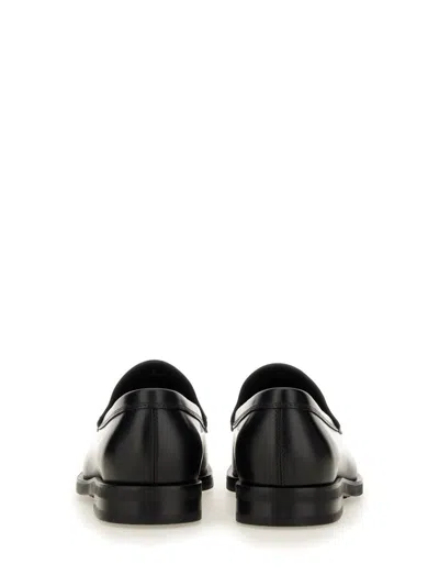 Tod's Smooth Leather Moccasin Loafers With Subtle Stitching In Black