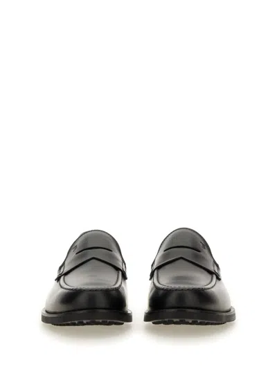 Tod's Smooth Leather Moccasin Loafers With Subtle Stitching In Black