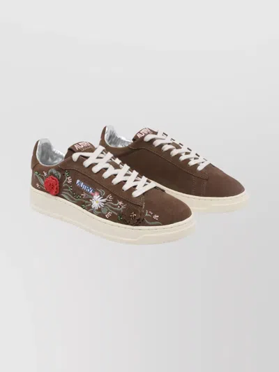 Autry Low-top Sneakers With Floral Embroidery In Rich Brown In Multi