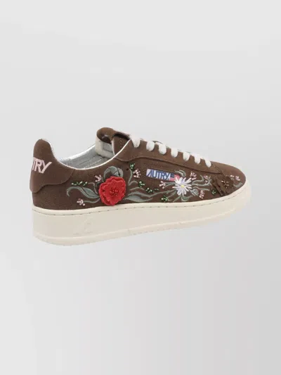 Autry Low-top Sneakers With Floral Embroidery In Rich Brown In Multi