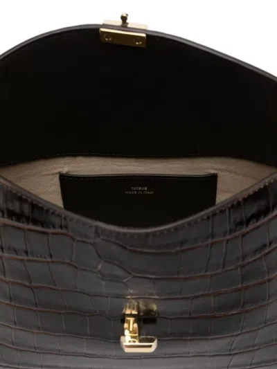 Totême Crocodile Effect Leather Top Handle Clutch In Black