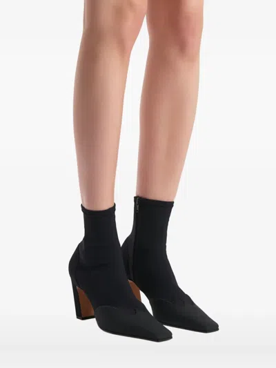 Khaite Nevada Leather-trimmed Stretch-knit Ankle Boots In Black