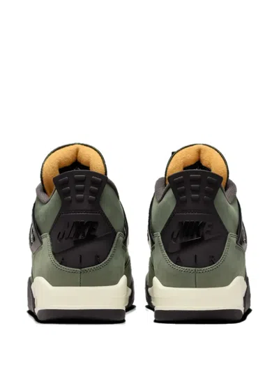 Jordan X Undefeated 4 Retro Sneakers In Green