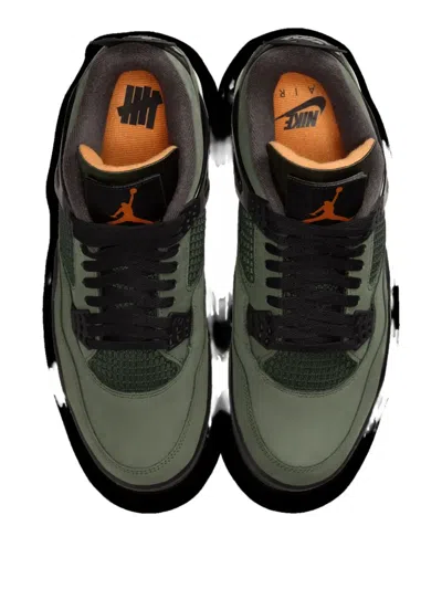 Jordan X Undefeated 4 Retro Sneakers In Green