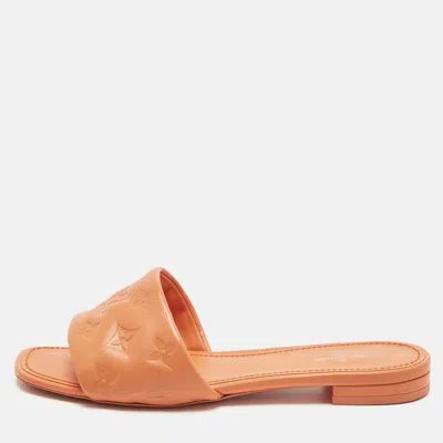 Pre-owned Louis Vuitton Orange Monogram Embossed Leather Revival Flat Slides Size 39