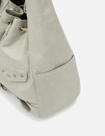 Deinet Stud Belted Bucket Bag