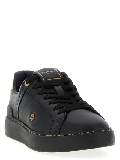 Balmain Sneakers 'court' Gold-tone Detail In Black