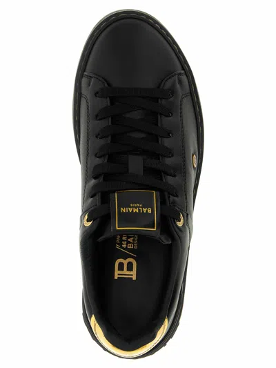 Balmain Sneakers 'court' Gold-tone Detail In Black