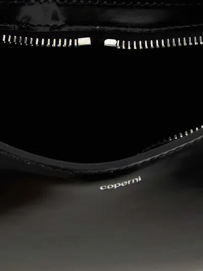Coperni Curved Glossy Top Handle Bag In Black