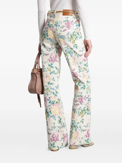 Chloé Flare Denim Jeans With All-over Flowers Print In Multi
