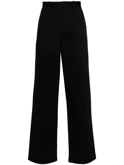 Axel Arigato Logo-tag Trousers In Black