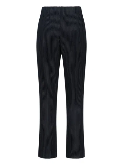Issey Miyake Tailored Trousers With Button And Pleats In Black