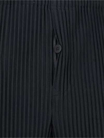 Issey Miyake Tailored Trousers With Button And Pleats In Black