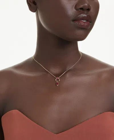 Swarovski Mesmera Gold-tone Plated Pendant Necklace In Pink