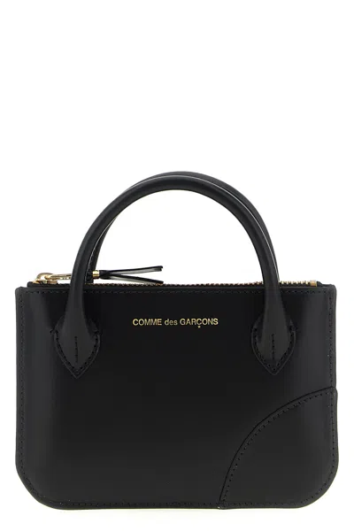 Comme Des Garçons Logo-print Wallet In Black