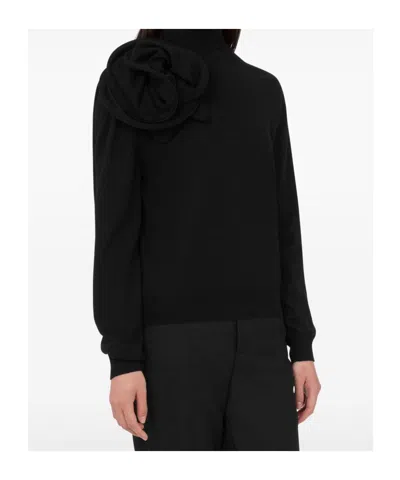 Moschino Black Turtleneck Sweater With Flower Detail In Black
