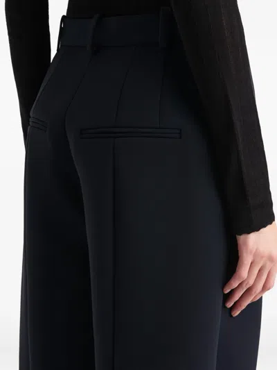 Khaite Dugan Pleated Double Face Crepe Pants In Blue