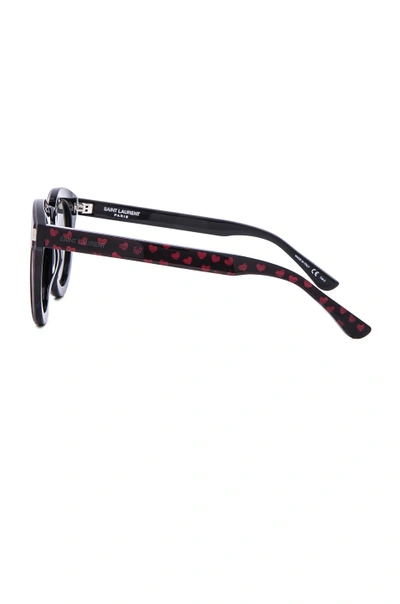 Shop Saint Laurent Sl 102 Sunglasses In Black. In Black & Red Hearts