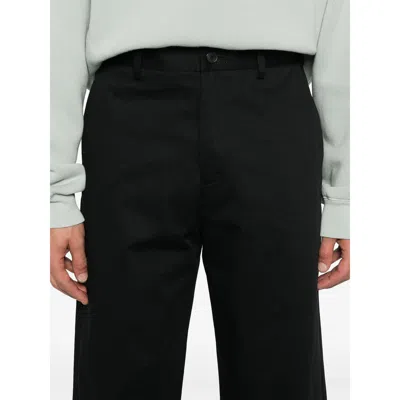 Axel Arigato Logo-tag Trousers In Black