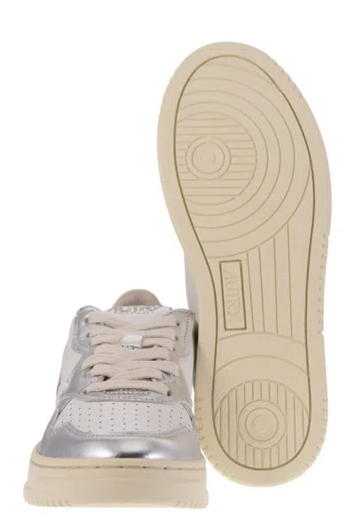 Autry Medalist Low Two-tone Sneakers In White And Metallic Silver Leather In Silver