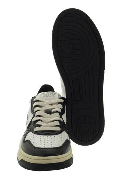 Autry Classic White Leather Sneakers In Black