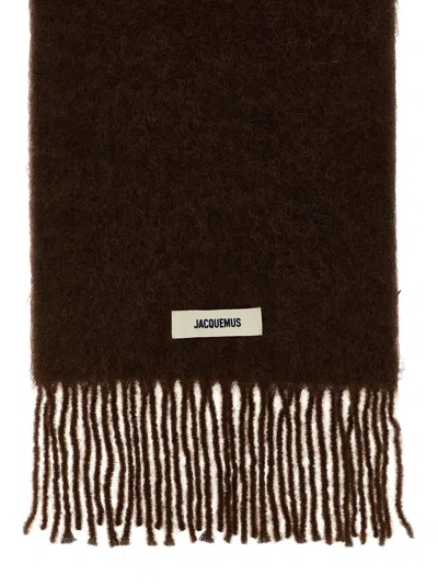 Jacquemus Carro Scarf With Soft Texture And Fringed Edges In Brown