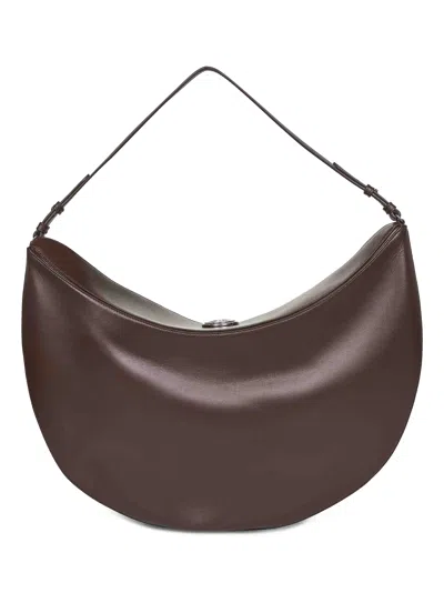 Jacquemus Le Calisso Rond Large Brown Shoulder Bag With Adjustable Strap And Embossed Logo In Leather Woman In Brown
