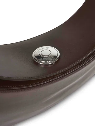 Jacquemus Le Calisso Rond Large Brown Shoulder Bag With Adjustable Strap And Embossed Logo In Leather Woman In Brown