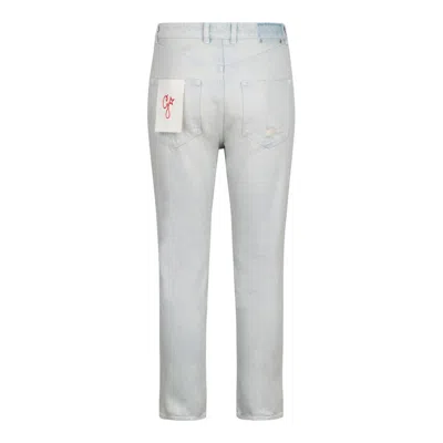 Golden Goose Distressed Logo Patch Jeans In Blue