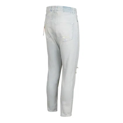 Golden Goose Distressed Logo Patch Jeans In Blue